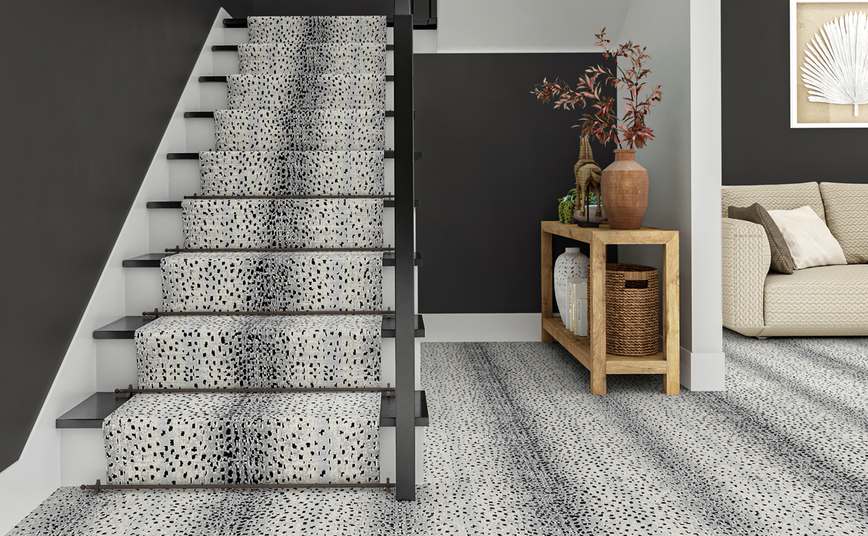black and grey animal print carpet and carpet runner on stairs